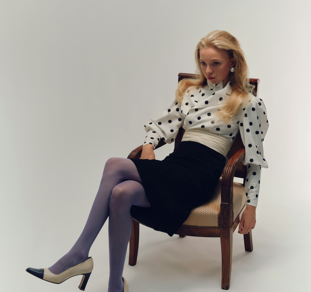 Holiday blues expressed through an introspective posture, capturing the emotional weight of December beyond celebration.