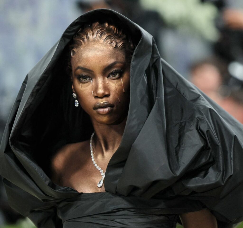 Anok Yai at Met Gala 2026 with gold tear makeup